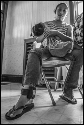 Mar?a Rosalia Mej?a Marroqu?n, a Guatemalan immigrant, was arrested in an immigration raid at the Agriprocessors meatpacking plant in Postville, Iowa, and was released to care for her child, but had to wear an ankle bracelet to monitor her movements.