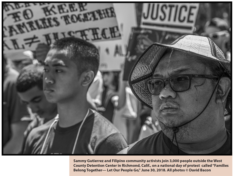 Sammy Gutierrez and Filipino community activists join 3,000 people outside the West County Detention Center in Richmond, Calif., on a national day of protest  called 