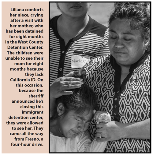Liliana comforts her niece, crying after a visit with her mother, who has been detained for eight months in the West County Detention Center. The children were unable to see their mom for eight months because they lack California ID. On this occasion, because the sherriff announced he's closing this immigrant detention center, they were allowed to see her. They came all the way from Fresno, a four-hour drive.